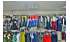 Изображение фотогаллереи №77 для раздела Разноцветные стеллажи с полками ДСП для продажи детской одежды серии KIDS-ДО