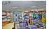 Изображение фотогаллереи №110 для раздела Разноцветные стеллажи с полками ДСП для продажи детской одежды серии KIDS-ДО