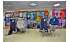 Изображение фотогаллереи №10 для раздела Разноцветные стеллажи с полками ДСП для продажи детской одежды серии KIDS-ДО