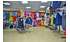 Изображение фотогаллереи №50 для раздела Разноцветные стеллажи со стеклянными полками для продажи детской одежды серии KIDS-ДО