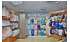 Изображение фотогаллереи №33 для раздела Разноцветные стеллажи с корзинами для продажи детской одежды серии KIDS-ДО