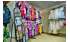 Изображение фотогаллереи №102 для раздела Разноцветные стеллажи с полками ДСП для продажи детской одежды серии KIDS-ДО