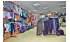 Изображение фотогаллереи №130 для раздела Разноцветные стеллажи с тонированными полками для продажи детской одежды серии KIDS-ДО
