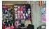 Изображение фотогаллереи №34 для раздела Разноцветные стеллажи с тонированными полками для продажи детской одежды серии KIDS-ДО