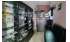 Изображение фотогаллереи №15 для раздела Хромированные стеллажи с полками ДСП для магазина по продаже электронных сигарет и жидкостей серии VAPE