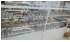 Изображение фотогаллереи №2 для раздела Хромированные стеллажи с тонированными полками для магазина сантехники