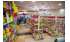 Изображение фотогаллереи №54 для раздела Разноцветные стеллажи с наклонными полками для магазина игрушек серии KIDS