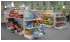 Изображение фотогаллереи №67 для раздела Разноцветные стеллажи с корзинами для магазина игрушек серии KIDS