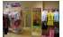Изображение фотогаллереи №112 для раздела Разноцветные стеллажи со стеклянными полками для продажи детской одежды серии KIDS-ДО