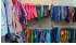Изображение фотогаллереи №21 для раздела Разноцветные стеллажи со стеклянными полками для продажи детской одежды серии KIDS-ДО