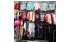 Изображение фотогаллереи №113 для раздела Разноцветные стеллажи с наклонными полками для продажи детской одежды серии KIDS-ДО