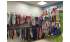 Изображение фотогаллереи №111 для раздела Разноцветные стеллажи с тонированными полками для продажи детской одежды серии KIDS-ДО