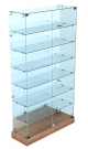 Стеклянная витрина-прилавок узкая с зеркальной стенкой и дверками на подиуме СВП-ХП-11