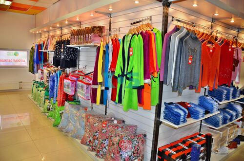 Стеллажи, вешала, эконмпанели для магазина Домашний Уют