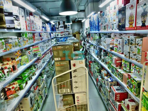 Торговые стеллажи и стойки для отдела посуды в Универсам №1